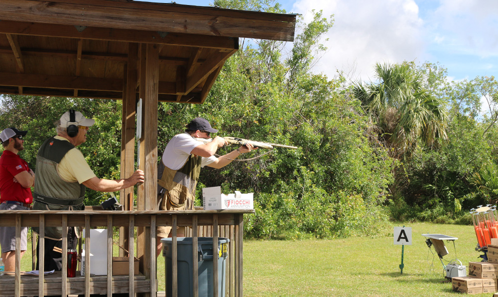 Person shooting a clay bird 