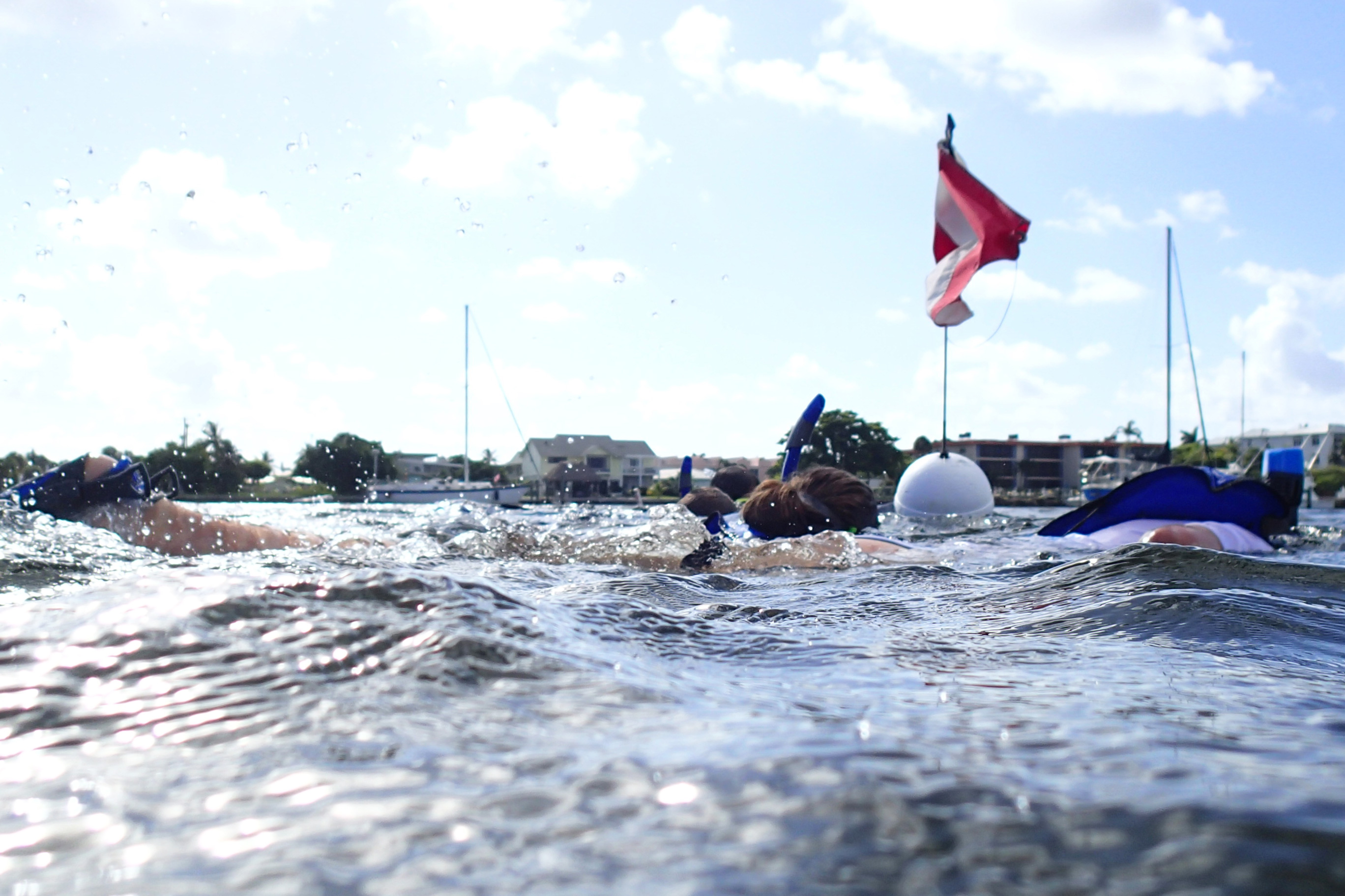 summer campers snorkeling