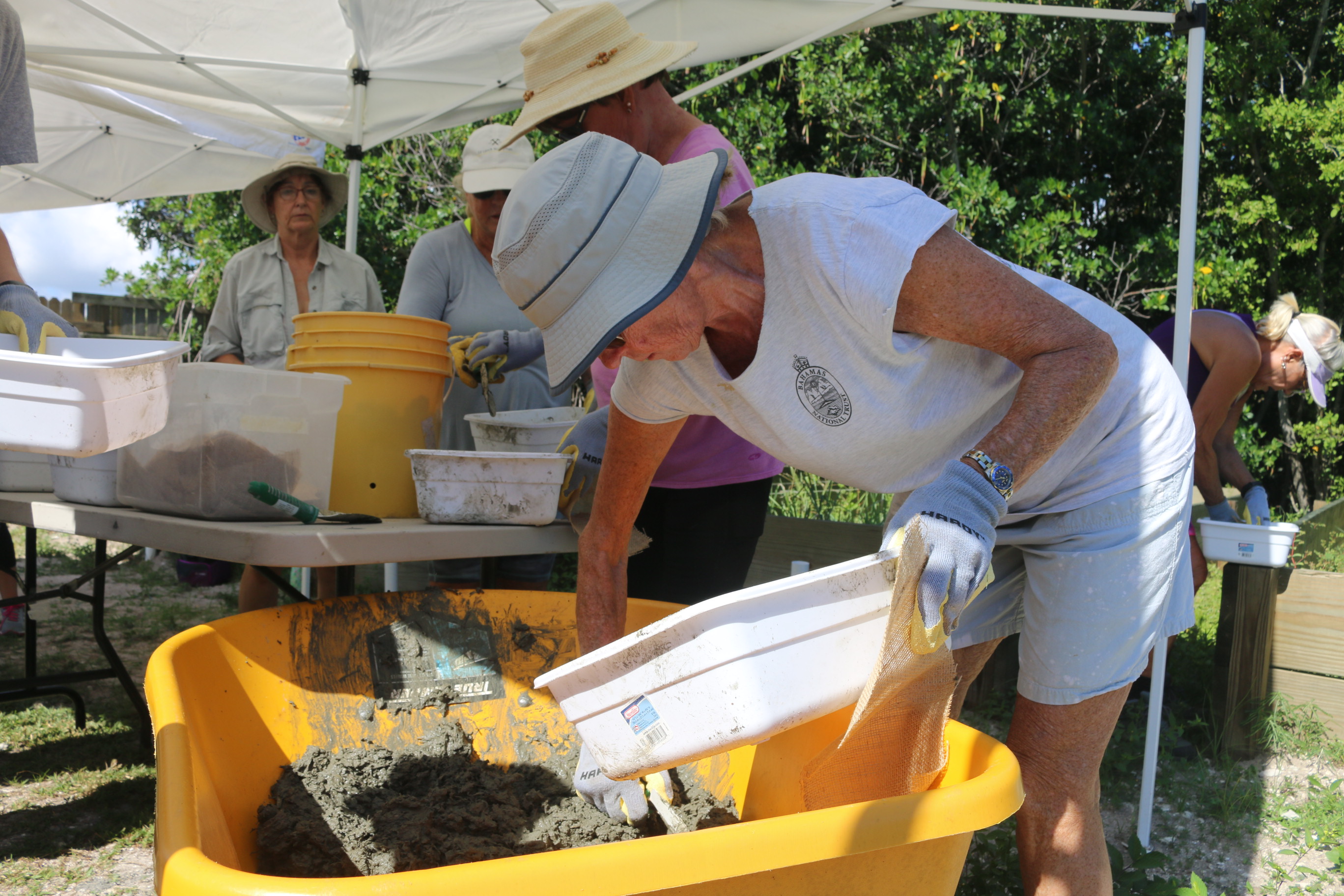 volunteers creating oyster reef restoration modules 