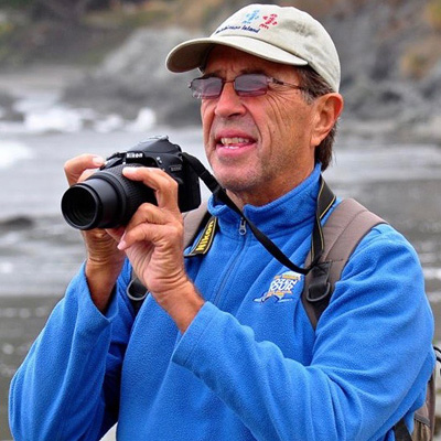 Volunteer holding his camera 