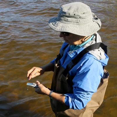 Scientist monitoring the water