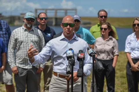 U.S. Rep. Mast speaks to the media at the Port Mayaca lock